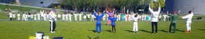 foto van judotraining op het gras van het Museumplein in Amsterdam